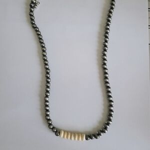 Elegant Silver and Cream Beaded Necklace